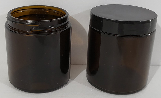 new 4 oz amber glass jar
